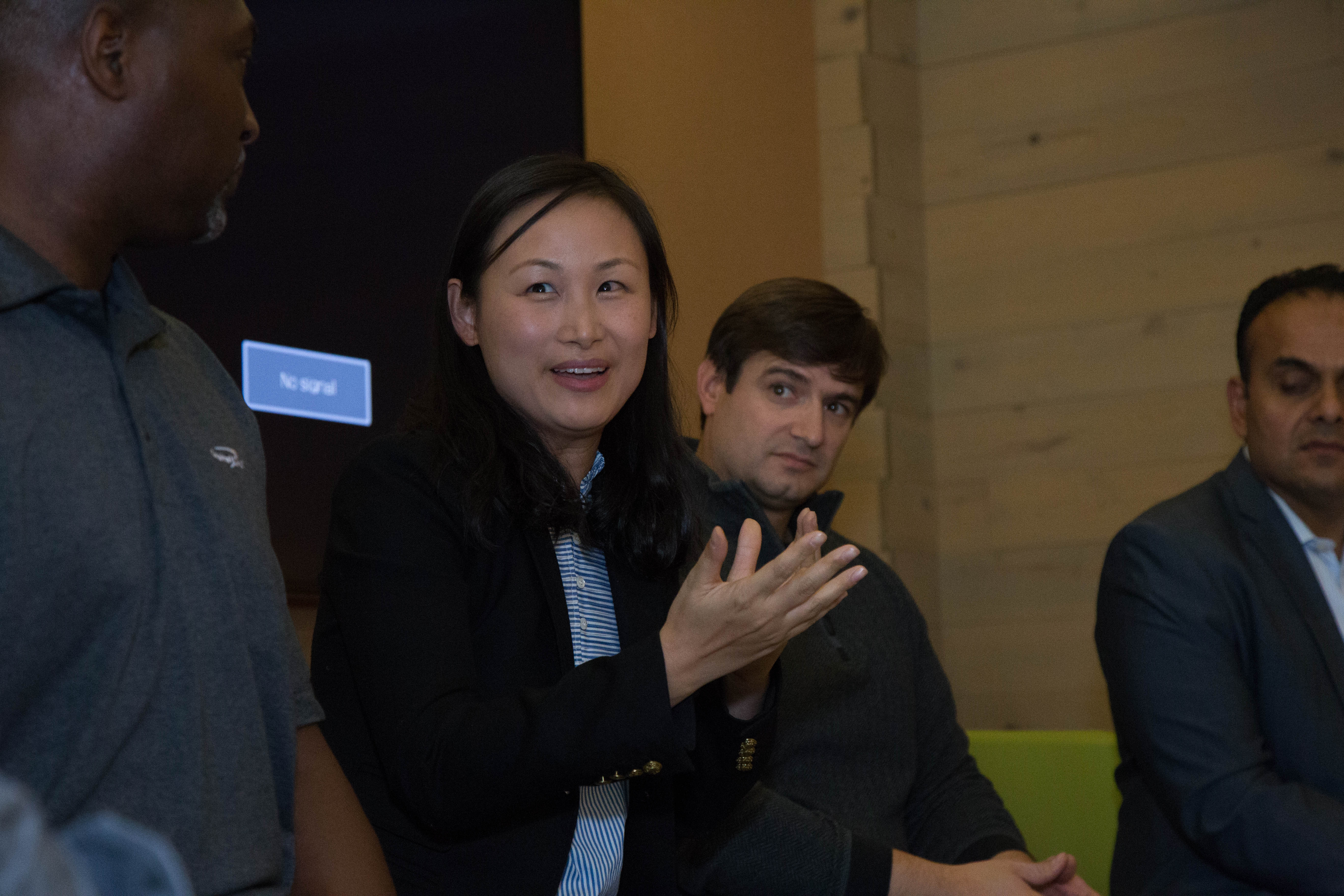 During a Capital One associate panel discussion with the TAF student’s Capital One’s Zoe Yang tells the students that success requires having “a mindset about getting things done and solving problems.” At left is Tony Wilson, and on the right are Michael Walker and Sunjay Pandey.