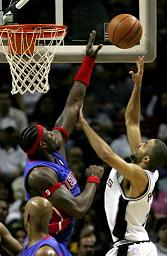 Tony Parker tries to shoot over Ben Wallace