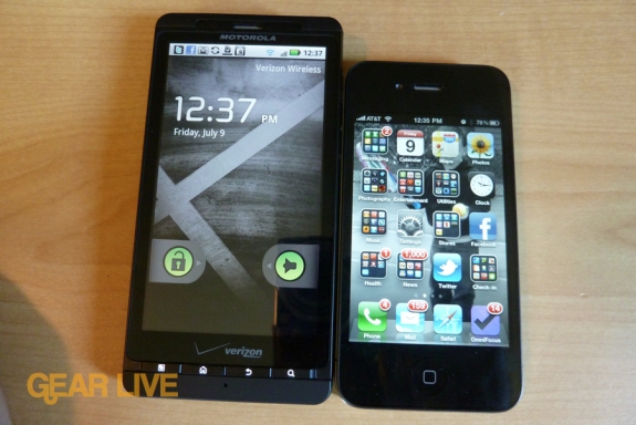 motorola droid x images. Here's an image of the Motorola Droid X next to the iPhone 4.