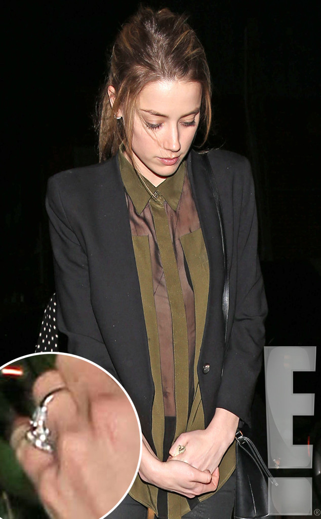 Amber Heard wearing her engagement ring