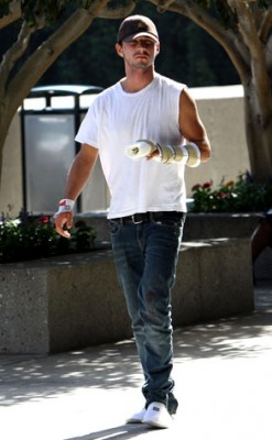 Shia LaBeouf shows off his injured rest whilst on a smoke break