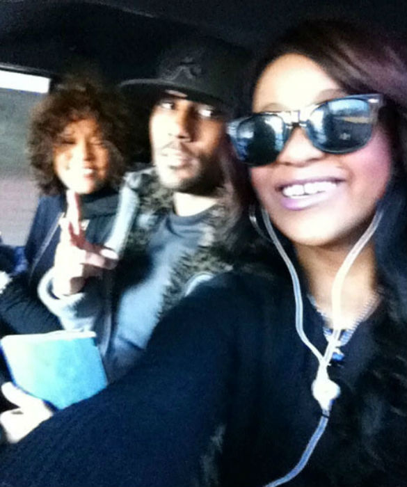 Whitney Houston with her son Nick and daughter Bobbi Kristina