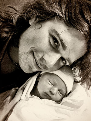 Zac Hanson with his youngest son