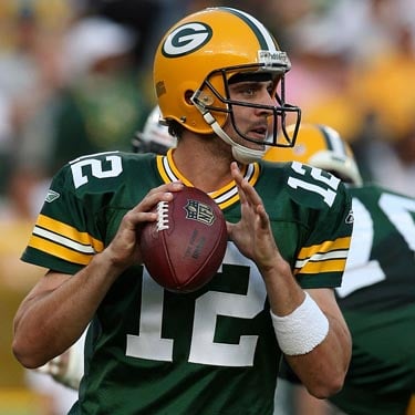 Aaron Rodgers leads his Green Bay Packers during the NFC Wild Card weekend