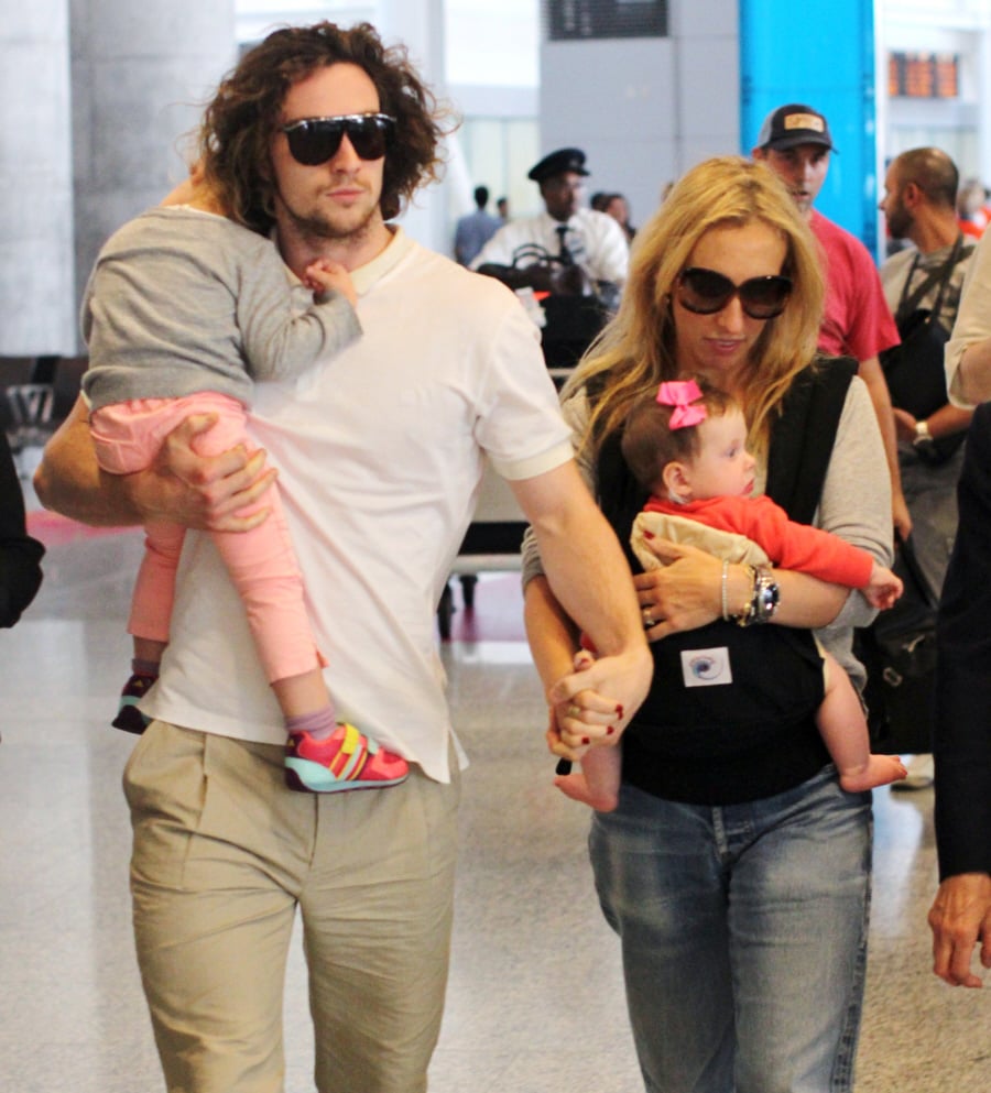 Aaron and Sam Taylor-Johnson with their kids