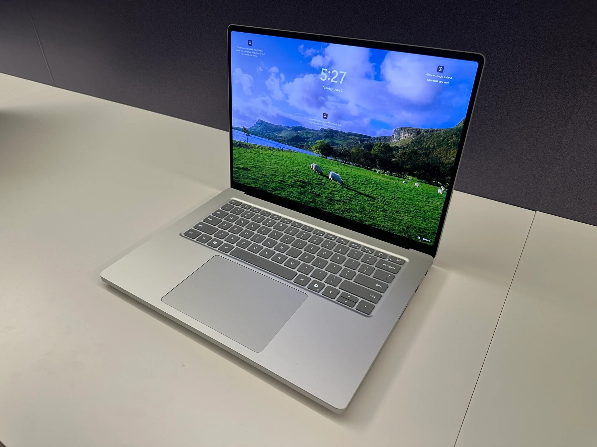 Microsoft Surface Laptop Ultra open on a desk, shown at a Microsoft event