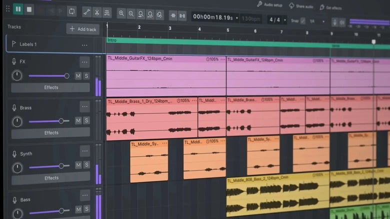 Audacity 4.0 running in its new dark interface with colored audio clips stacked on a multitrack timeline