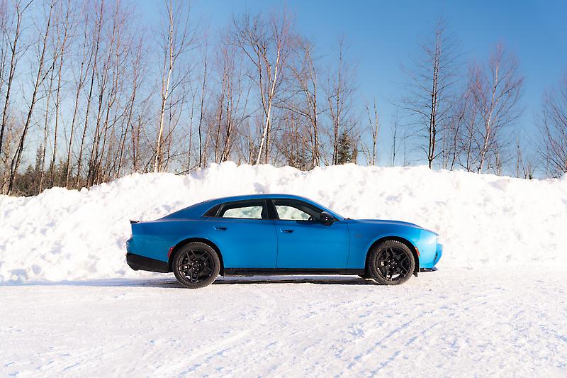 Blue Dodge Charger R/T four door side profile