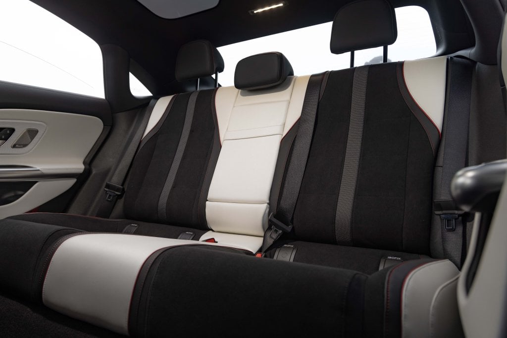 Official Mercedes-Benz electric CLA 250+ launch image: black and white rear seating