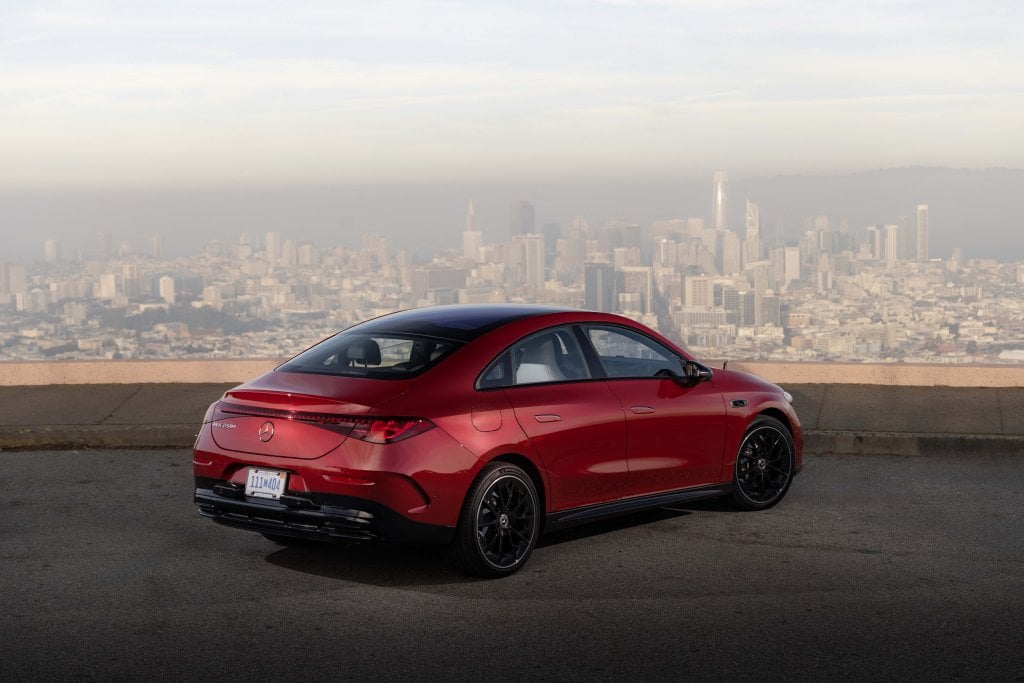 Official Mercedes-Benz electric CLA 250+ launch image: rear three-quarter view in Patagonia Red with visible CLA 250+ badging