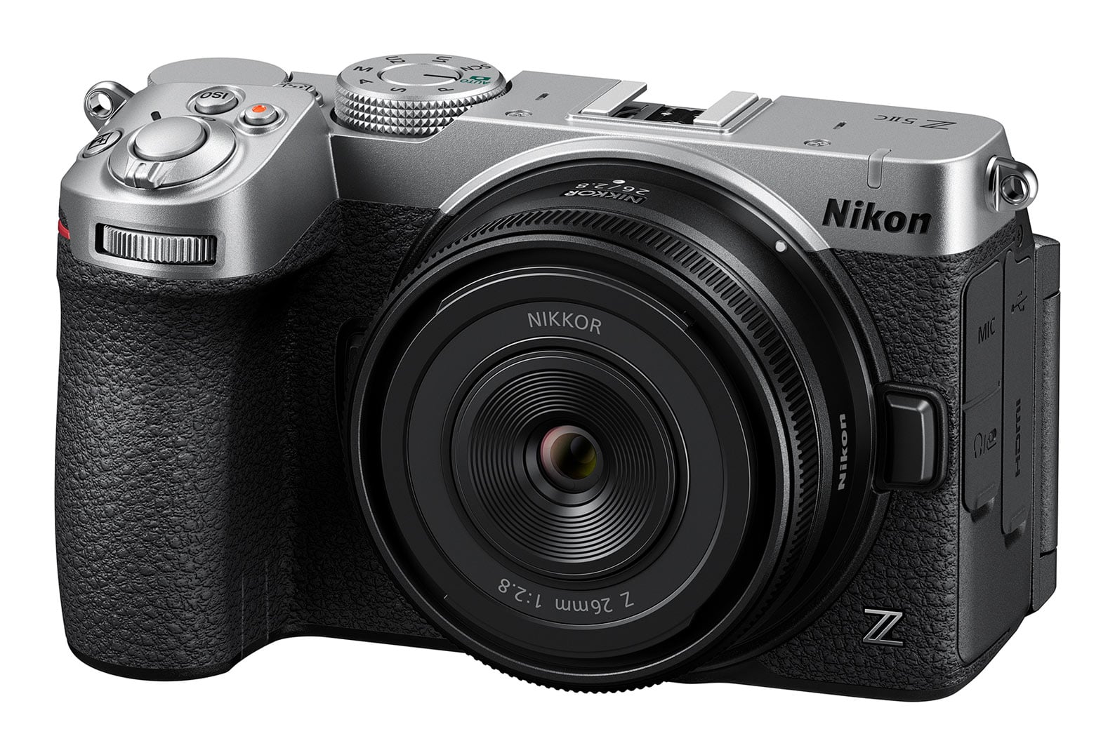 Nikon Z5IIC full-frame mirrorless camera in silver, showing the flat top plate with no electronic viewfinder hump, fitted with a NIKKOR Z 26mm f/2.8 pancake lens