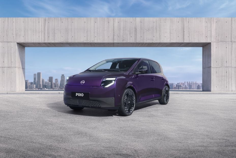Purple Nissan Pixo electric city car shown from the front three-quarter angle in an official Nissan press photo