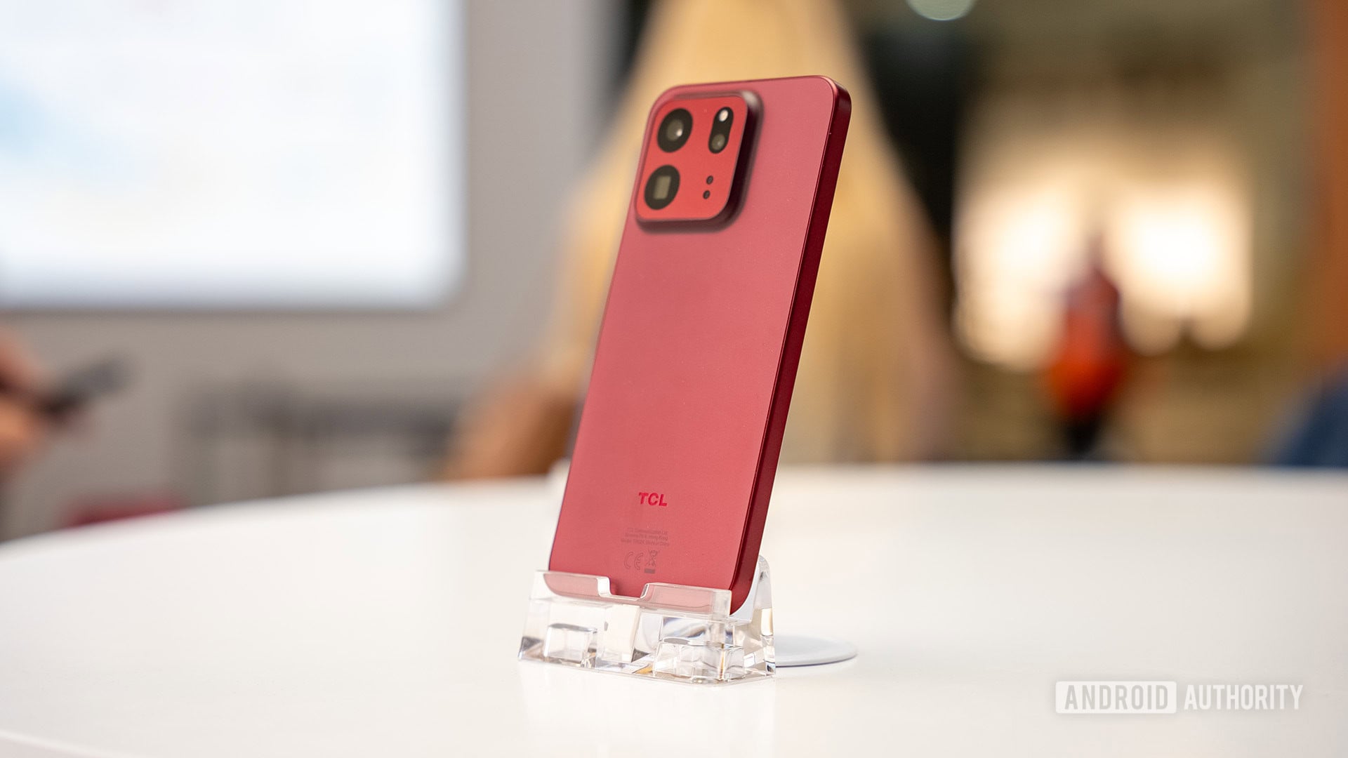 TCL P80 Ultra smartphone shown from the front and back, with its triple rear camera array and NXTPAPER AMOLED display
