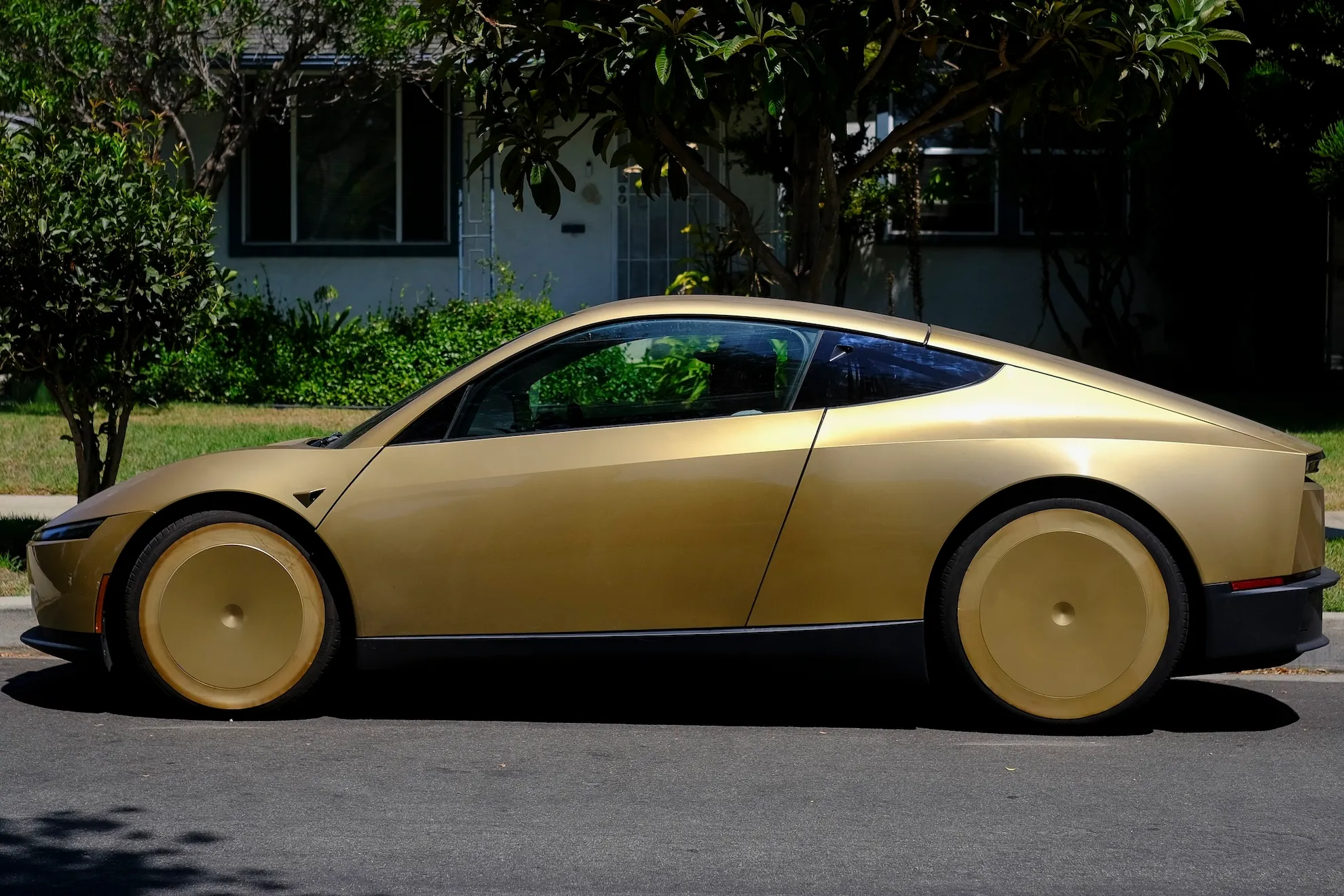 A Tesla Cybercab robotaxi on a public street