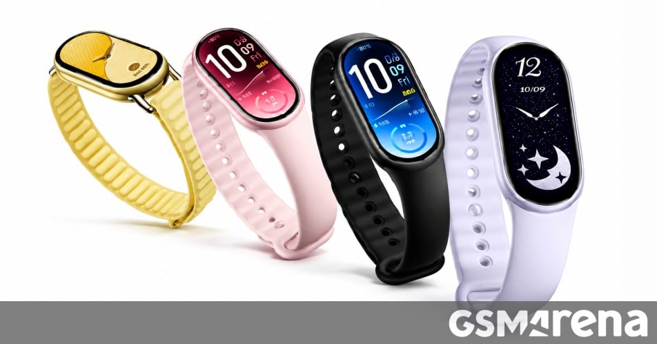 Xiaomi Smart Band 11 shown from the front, its pill-shaped AMOLED display lit up on a fabric strap